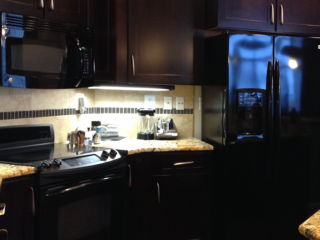 Fire Damaged Kitchen AFTER, insurance repair contractor